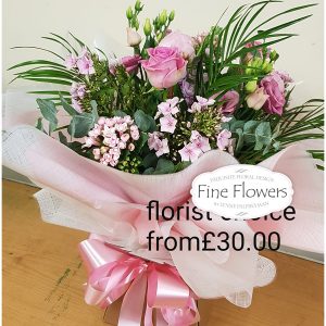 Florist choice valentine bouquet - boxed or in a bag.