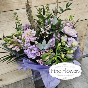 Handtied in water boxes, including antirrhinum, stock, blooms, lisianthus, alstroemeria, grasses, phlox, and many mixed foliages.