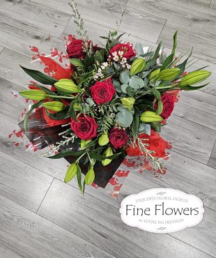 Handtied bouquet to include 3x stems large white lilies,6red roses with mixed foliages. Presented in water/boxed