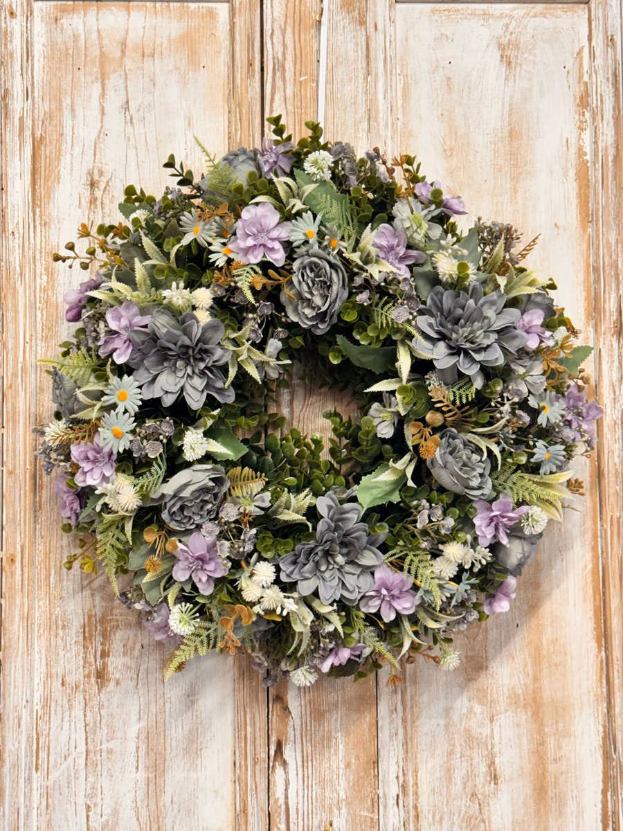 Coastal wreath featuring Roses, Dahliah, Blossom, Daisy, Grey Gypsophila, Mixed foliages including ferns and Eucalyptus.