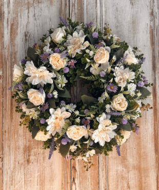 Heather Wreath featuring Roses, Dahlia, Daisy’s, Thistle, Lavender, Mixed foliages including ferns and Eucalyptus.