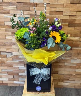 Summer Haze bouquet of Sunflowers, phlox, Lisianthus, bloom, Solidaster, Anthurium and Pussy Willow.
