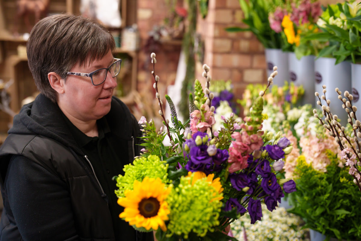 Fresh flowers delivered in Rugeley and Staffordshire handcrafted by our dedicated team. Here Helen is hand crafting a beautiful spring bouquet, ready for a waiting customer