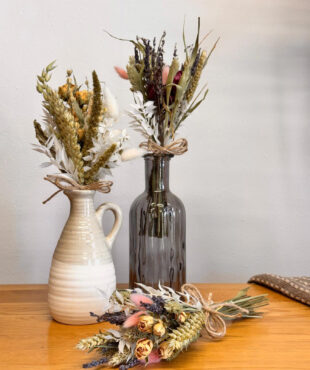 Send a small dried flower posy with white or grey vase. Wheat, bunny tails & roses make it a charming, lasting gift with UK delivery.